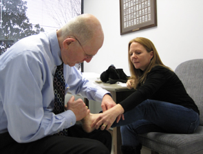 Examining injured ankle